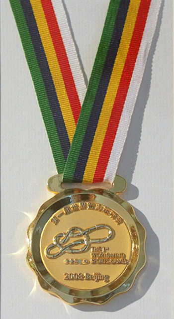 GM Alexandra Kosteniuk’s Gold Medal from the 2008 Mind Sports Games, Beijing, China